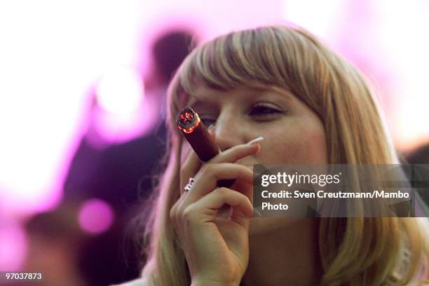 Woman smokes the new "Julieta" cigar on February 24 in Havana, Cuba. In response to cigar sales lagging, Cuba is trying to interest women smokers in...