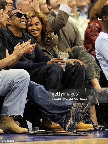 Rapper Jay-Z and singer Beyonce Knowles attend a game between the Los Angeles Lakers and Dallas Mavericks on February 24, 2010 at American Airlines...