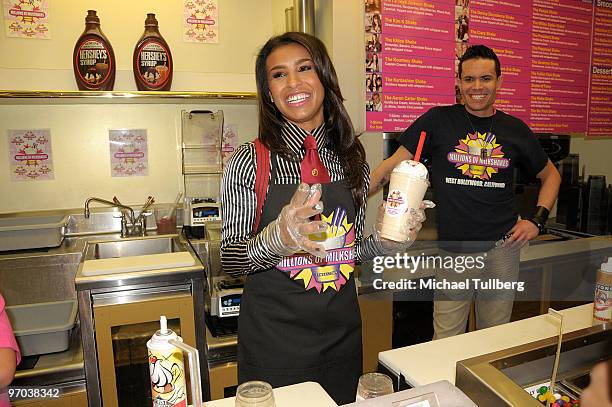 Singer Melody Thornton of the Pussycat Dolls poses with an example of her ''Melody Milkshake'' for Haiti relief at the Millions Of Milkshakes store...