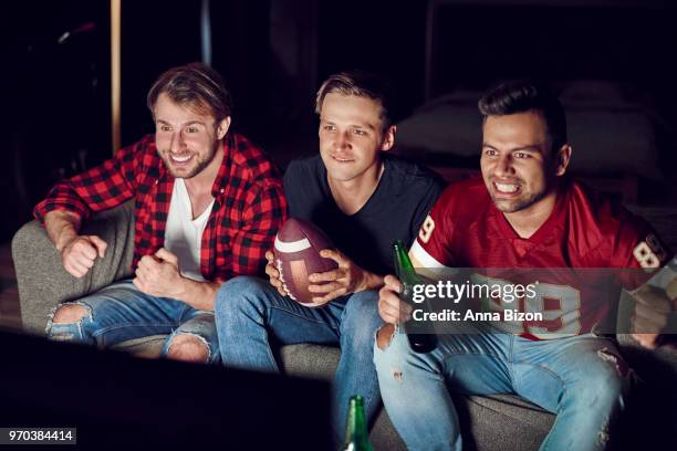 stressed men watching match in concentration. debica, poland - anna bizon foto e immagini stock