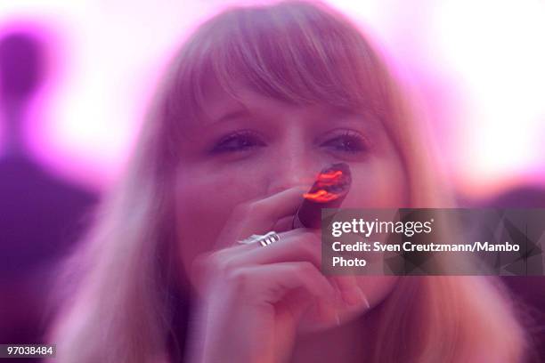 Woman smokes a Cuban cigar on February 24 in Havana, Cuba. In response to cigar sales lagging, Cuba is trying to interest women smokers in "the...