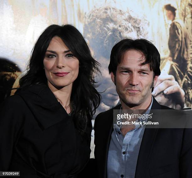 Actress Michelle Forbes and actor Stephen Moyer arrive at the Los Angeles premiere of "The Pacific" on February 24, 2010 in Los Angeles, California.