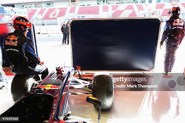 Red Bull Racing mechanics at work during a filming day prior to Formula One winter testing at the Circuit De Catalunya on February 24, 2010 in...