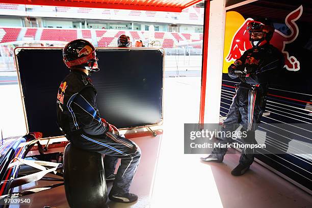 Red Bull Racing mechanics at work during a filming day prior to Formula One winter testing at the Circuit De Catalunya on February 24, 2010 in...