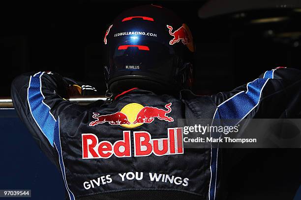 Red Bull Racing mechanic is seen at work during a filming day prior to Formula One winter testing at the Circuit De Catalunya on February 24, 2010 in...