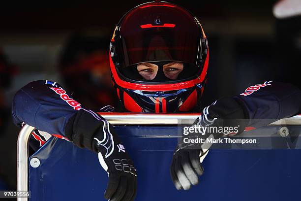 Red Bull Racing mechanic is seen at work during a filming day prior to Formula One winter testing at the Circuit De Catalunya on February 24, 2010 in...