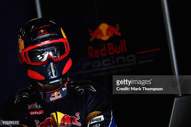Red Bull Racing mechanic is seen at work during a filming day prior to Formula One winter testing at the Circuit De Catalunya on February 24, 2010 in...