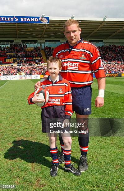 Gloucester captain Phil Vickery and mascot before the Parker Pen Shield Semi-Final match between Gloucester and Sale played at Franklins Gardens, in...