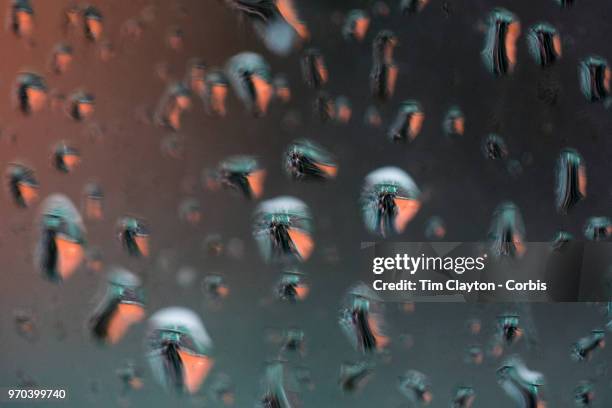 June 6. French Open Tennis Tournament - Day Eleven. The covered clay court on Court Philippe-Chatrier refelcted in the rain drops as rain stopped...