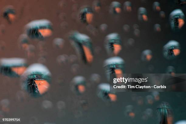 June 6. French Open Tennis Tournament - Day Eleven. The covered clay court on Court Philippe-Chatrier refelcted in the rain drops as rain stopped...