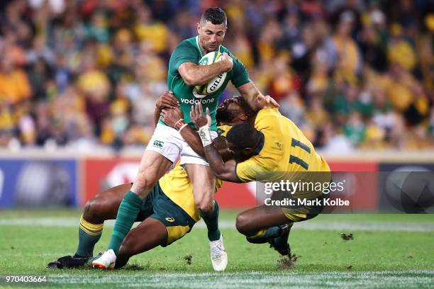 Rob Kearney of Ireland is tackled during the International Test match between the Australian Wallabies and Ireland at Suncorp Stadium on June 9, 2018...