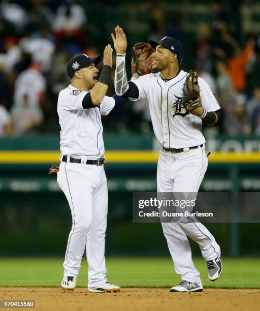 Jose Iglesias of the Detroit Tigers celebrates with Victor Reyes of the Detroit Tigers after a win over the New York Yankees in game two of a...