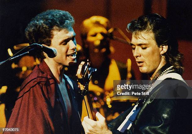 Gary and Martin Kemp of Spandau Ballet perform on stage on the 'Parade' tour at Wembley Arena on December 8th, 1984 in London, England.