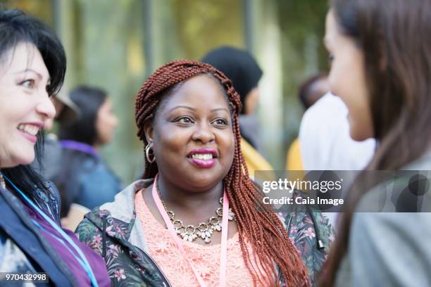 Women talking at conference