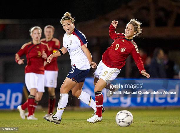 Svenja Huth of Germany and Amber Brooks of USA compete for the ball during the Women«s international friendly match between Germany and USA on...