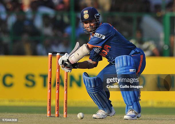 Sachin Tendulkar of India hits out on his way to a record double century during the 2nd ODI between India and South Africa at Captain Roop Singh...