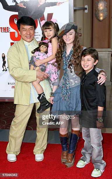 From L to R, actors Jackie Chan, Alina Foley, Madeline Carroll and Will Shadley arrive at the the premiere "The Spy Next Door" in Los Angeles on...