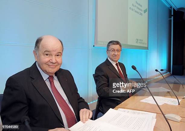 French bank Credit Agricole Chief Executive Georges Pauget poses along with Chairman of the Board Rene Carron on February 25, 2010 prior to a press...