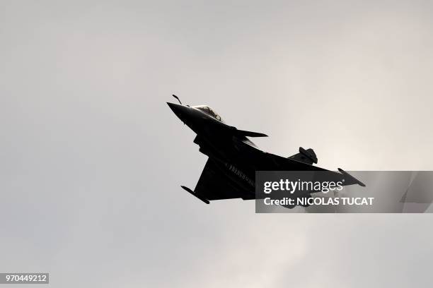 Rafale fighter jet of the French Navy performs during the International seaplane show in Biscarrosse, southwestern France, on June 9, 2018.