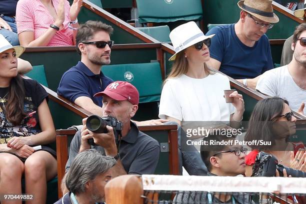Philip Schneider and actress Hilary Swank attend the Women Final of the 2018 French Open - Day Fourteen at Roland Garros on June 9, 2018 in Paris,...