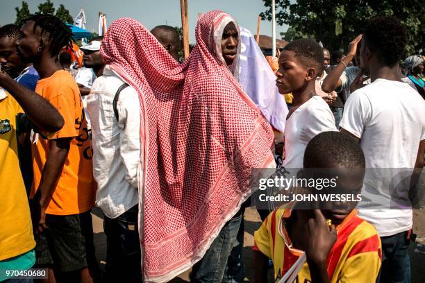 Supporters of Moise Katumbi, leader of the coalition party Ensemble, attend a rally of all the opposition parties in the coalition on June 9, 2018 in...