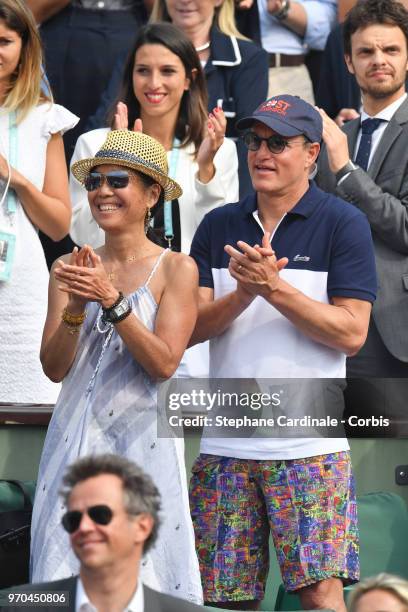 Actor Woody Harrelson and his wife Laura Louis attend the Women Final of the 2018 French Open - Day Fourteen at Roland Garros on June 9, 2018 in...