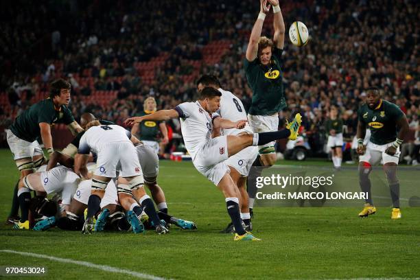 England's fly-half George Ford kicks the ball during the first rugby union test match between South Africa and England at Emirates Airline Park in...