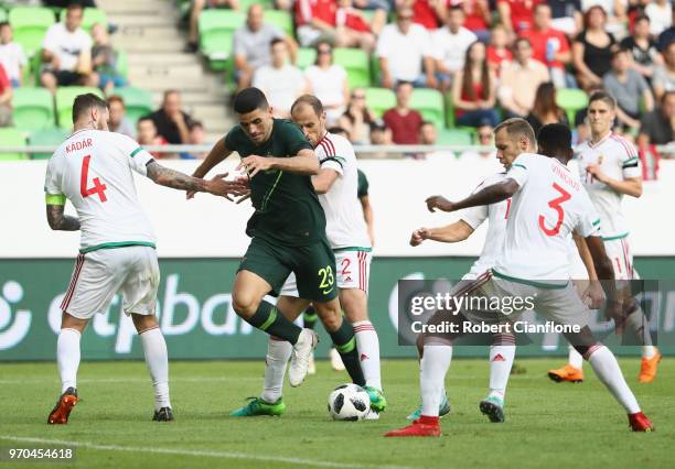 Tomi Juric of Australia is challenged by his opponents during the International Friendly match between Hungary and Australia at Groupama Arena on...