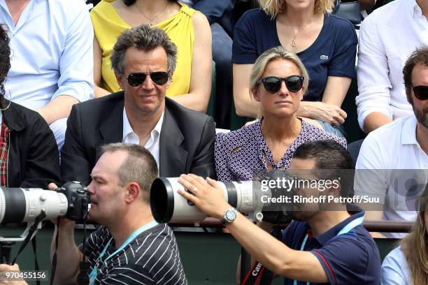 Journalist Anne-Sophie Lapix and her husband Arthur Sadoun attend the 2018 French Open - Day Fourteen at Roland Garros on June 9, 2018 in Paris,...