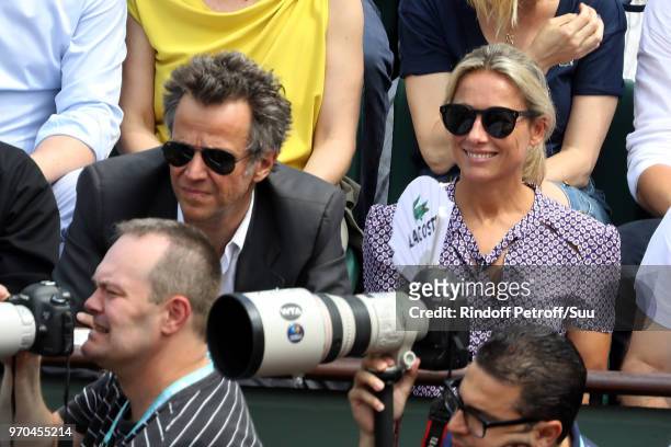 Journalist Anne-Sophie Lapix and her husband Arthur Sadoun attend the 2018 French Open - Day Fourteen at Roland Garros on June 9, 2018 in Paris,...