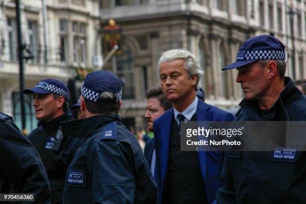 Dutch Leader of the Opposition Geert Wilders of nationalist Party for Freedom surrounded by police during a 'Free Tommy Robinson' Protest where he...