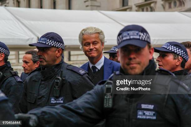 Dutch Leader of the Opposition Geert Wilders of nationalist Party for Freedom surrounded by police during a 'Free Tommy Robinson' Protest where he...