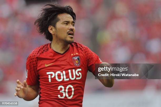 Shinzo Koroki of Urawa Red Diamonds looks on during the J.League Levain Cup Play-Off second leg between Urawa Red Diamonds and Ventforet Kofu at...