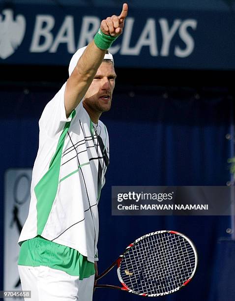 Austria's Jurgen Melzer celebrates after beating Marin Cilic of Croatia at the end of their quarter-final match on the fourth day of the...