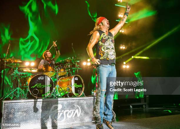 Rikki Rockett and Bret Michaels of Poison perform during the Nothin' But a Good Time Tour 2018 at DTE Energy Music Theater on June 8, 2018 in...