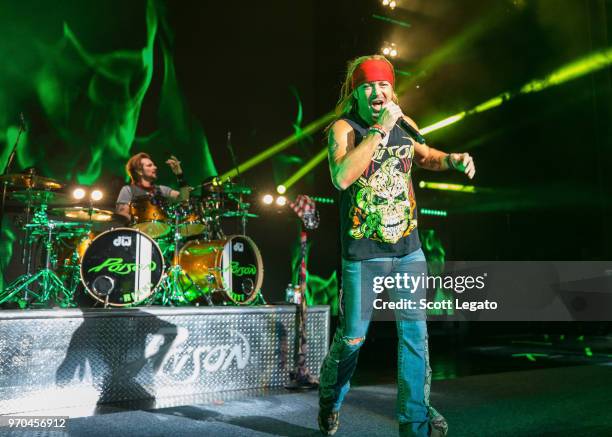 Rikki Rockett and Bret Michaels of Poison perform during the Nothin' But a Good Time Tour 2018 at DTE Energy Music Theater on June 8, 2018 in...