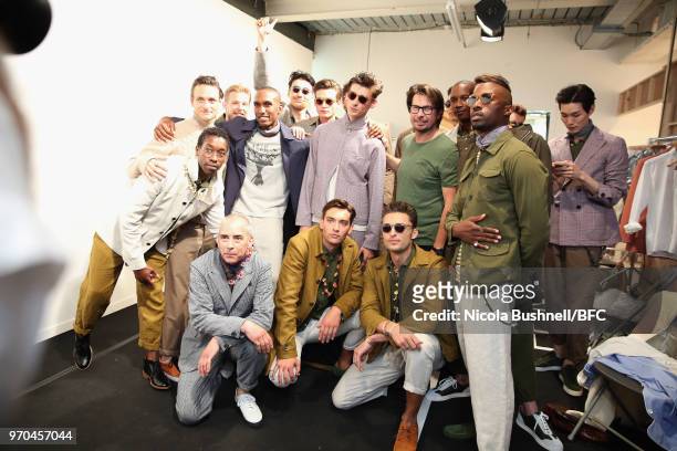 Hu Bing fashion designer Oliver Spencer , Eric Underwood and models backstage ahead of Spencer's show during London Fashion Week Men's June 2018 at...