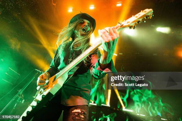 DeVille of Poison performs during the Nothin' But a Good Time Tour 2018 at DTE Energy Music Theater on June 8, 2018 in Clarkston, Michigan.