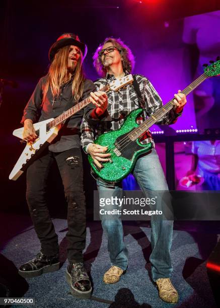 DeVille and Bobby Dall of Poison perform during the Nothin' But a Good Time Tour 2018 at DTE Energy Music Theater on June 8, 2018 in Clarkston,...