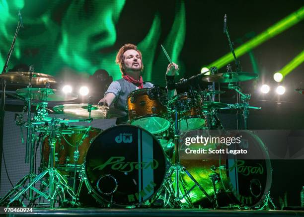 Rikki Rockett of Poison performs during the Nothin' But a Good Time Tour 2018 at DTE Energy Music Theater on June 8, 2018 in Clarkston, Michigan.