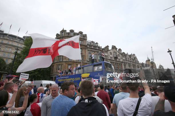 Supporters of Tommy Robinson on a open top bus during their protest in Trafalgar Square, London calling for his release from prison.