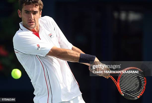 Marin Cilic of Croatia returns during his quarter-final match against Austria's Jurgen Melzer on the fourth day of the two-million-dollar ATP Dubai...