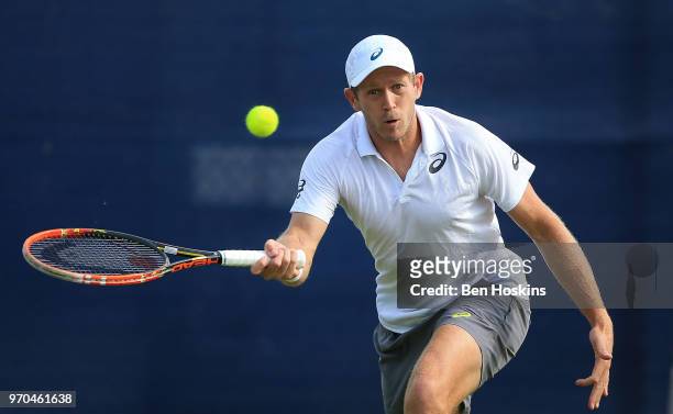Brydan Klein of Great Britain hits a forehand during his qualifying match against Marcus WIllis of Great Britain Day One of the Nature Valley Open at...