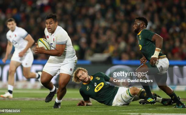 Billy Vunipola of England breaks with the ball during the first test match between South Africa and England at Elllis Park on June 9, 2018 in...