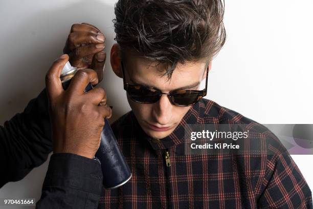 Model backstage ahead of the Oliver Spencer show during London Fashion Week Men's June 2018 at the BFC Show Space on June 9, 2018 in London, England.