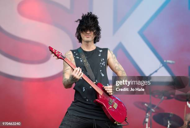 Sam Bettley of Asking Alexandria performs at Donington Park on June 9, 2018 in Donington, England.