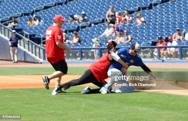 Jonathan Scott and Drew Scott participate in 28th Annual City of Hope Celebrity Softball Game on June 9, 2018 in Nashville, Tennessee.