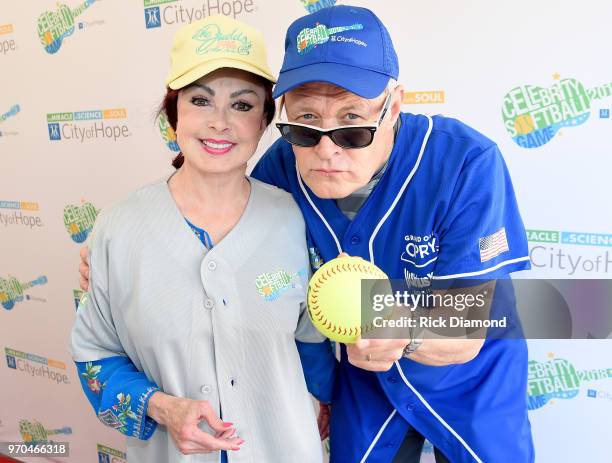 Naomi Judd and Bill Cody arrive at the 28th Annual City of Hope Celebrity Softball Game on June 9, 2018 in Nashville, Tennessee.