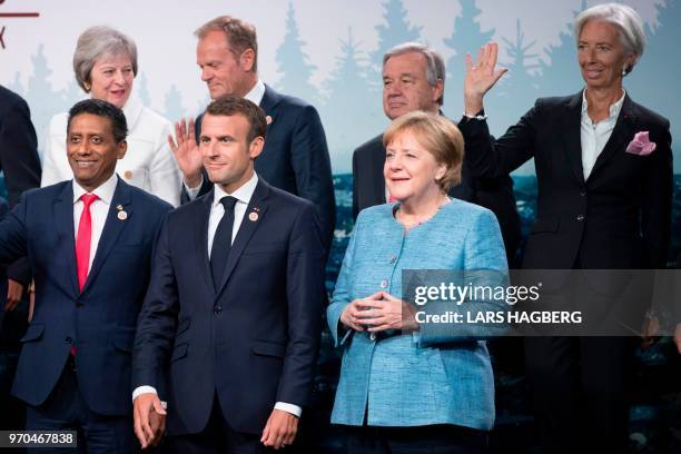 World leaders attend the G7 Outreach Summit family photo in La Malbaie, Quebec, June 9, 2018. : Seychelles President Danny Faure; French President...