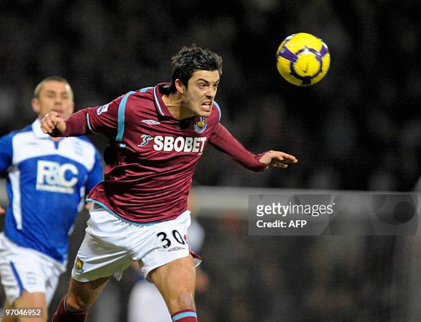 West Ham's English defender James Tomkins in action during the English Premier League football match between West Ham United and Birmingham City at...